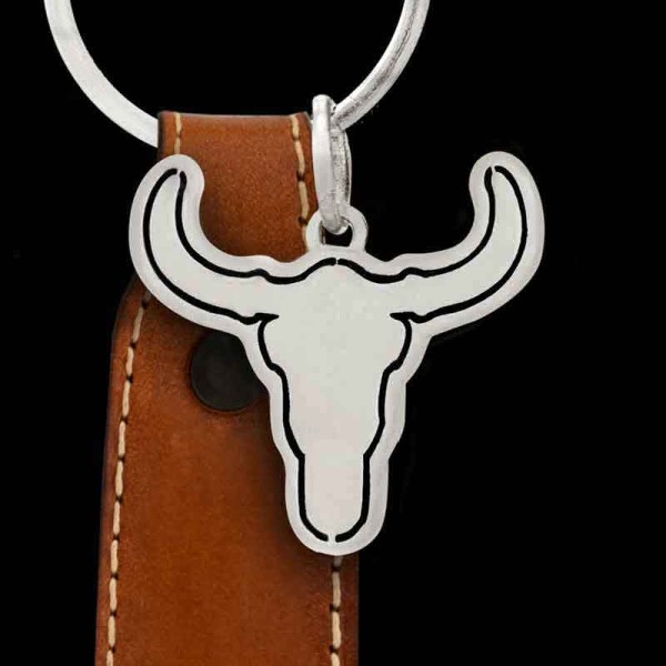 "The Searchers Custom Keychain is the perfect, simply designed accessory to show off your Western style. This keychain features a genuine leather fob and a sturdy metal ring. This keychain comes with a genuine leather fob and ring.The leather fob mea